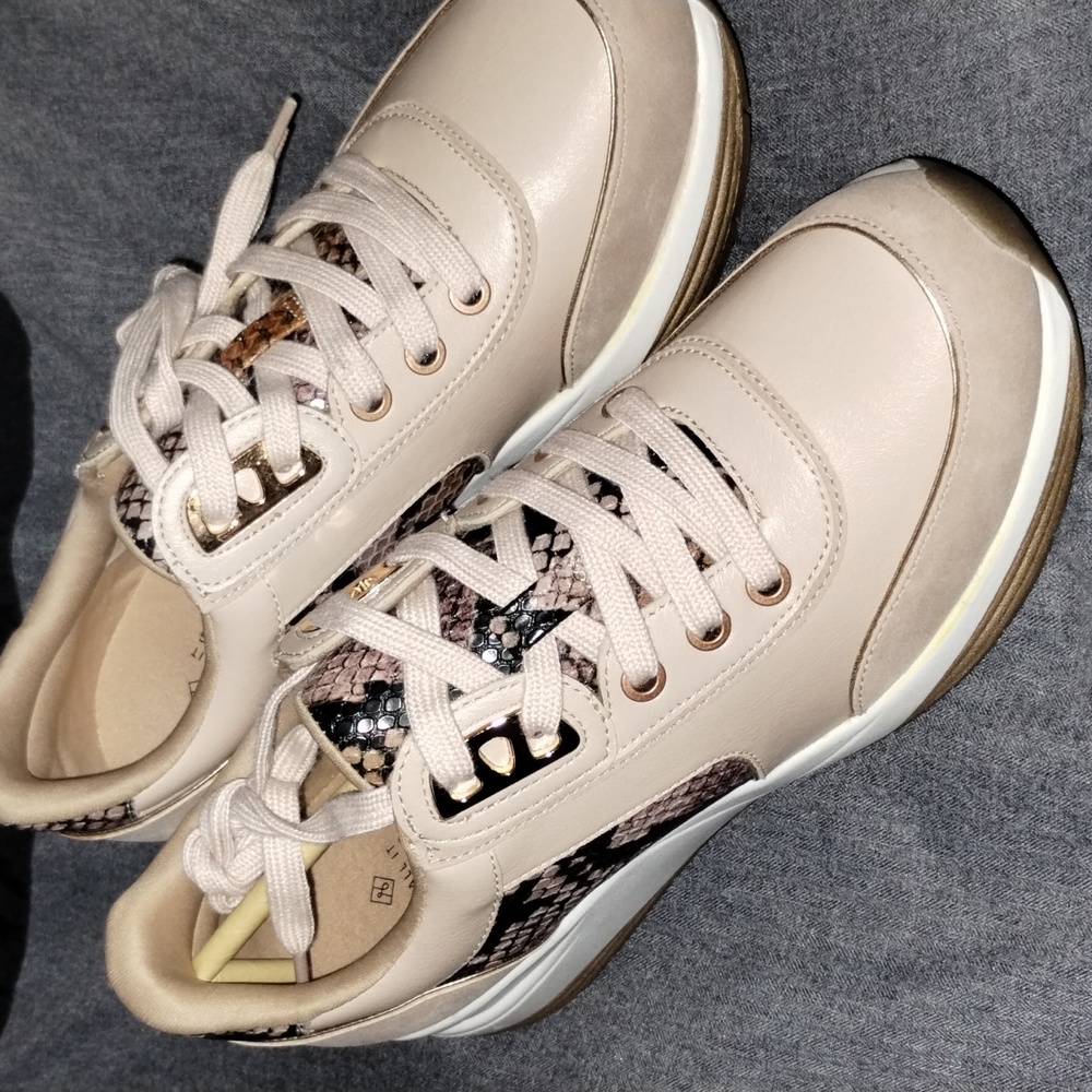 Call it spring. Rose gold vegan leather and snake skin sneakers.